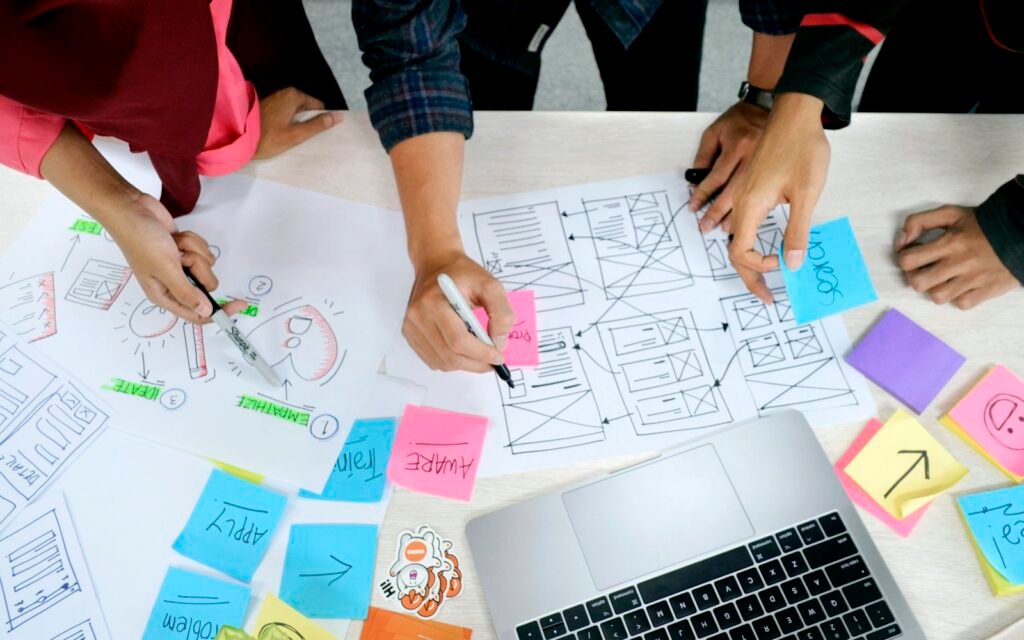 Planning a website with sticky notes and wireframes